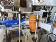 Automatic labeling machine for flat cylindrical bottles and jars Maqmundi