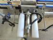 Automatic labeling machine for flat cylindrical bottles and jars Maqmundi