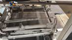 Automatic L-sealer with shrink tunnel.