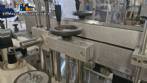 Automatic double head labeling machine for flat bottles Bauch Campos