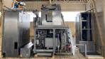 Tetra Pak A3 aseptic filling machine with cardboard packer 70 and tray shrink 51.