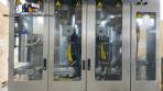Tetra Pak A3 aseptic filling machine with cardboard packer 70 and tray shrink 51.