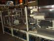 Linear filling machine with thermoforming