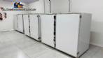 Stainless steel dehydrator oven with 120 trays.