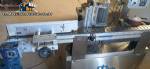 Automatic self-adhesive labeling machine for cylindrical bottles