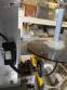 Automatic self-adhesive labeling machine for cylindrical bottles