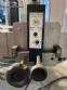 Automatic self-adhesive labeling machine for cylindrical bottles