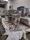Line for filling powdered products in rigid bottles Optima