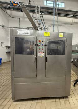 Metal can filling and crimping machine with washer, rinser, and sterilizer for cream, condensed milk, sauces, and tomato extract. Made in the Metal�rgica Mococa dairy industry.