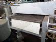 Conveyor oven with direct flame