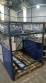 Pick and place product feeder for flowpack transfer cartoning machine