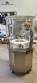 Complete filling line with Tecman Nelpas Tecnoenvase Tudela bottle filling, labeling, capping, and positioning machines for cosmetic liquids.