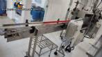 Line for brine filling manual product insertion and automatic capping