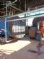 Wood-fired flame tube boiler for steam generation