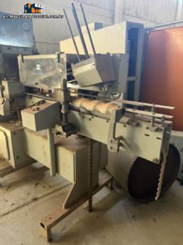 Automatic cartoning or case-packing machine for cartons or cardboard boxes