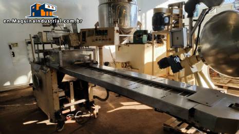 Otto Haensel V3 automatic cellophane wrapping machine for packaging boxes of teas, chocolates, perfumes, biscuits, creams, candies, sweets.