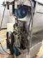 Stainless steel meat grinder with size 98 opening.