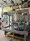 Packaging line with IMSB bung capper, Maqmundi labeler and accumulator table