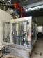 Packaging line with IMSB bung capper, Maqmundi labeler and accumulator table