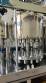 Packaging line with IMSB bung capper, Maqmundi labeler and accumulator table