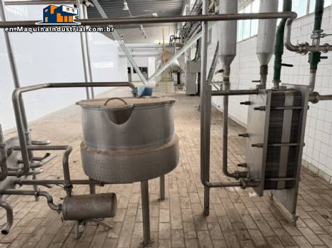 Stainless steel jacketed tank.  With heat exchanger and centrifugal pump.