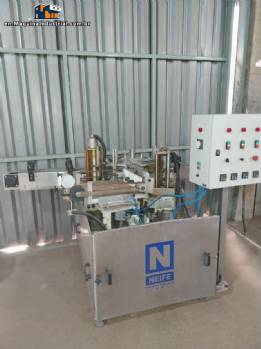 Neife automatic labeling machine for cans, jars and cylindrical bottles