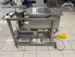 Unifiller stainless steel dosing pump with homogenizing mixer for bakery foods.