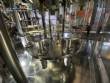 Gravimetric rotary filling machine in stainless steel with cabin
