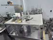 Automatic rotary dosing filling machine with sealer for Delgo cups, 3500 cups per hour.