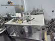 Automatic rotary dosing filling machine with sealer for Delgo cups, 3500 cups per hour.