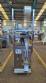 Dosing and packaging machine for granular and powdered products