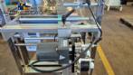 Dosing and packaging machine for granular and powdered products