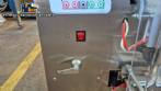 Dosing and packaging machine for granular and powdered products