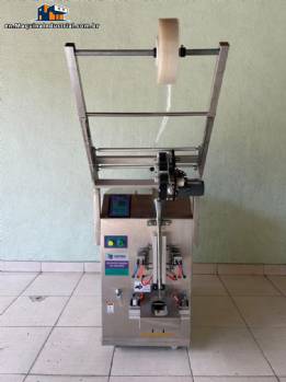 Cetro automatic sachet filling and packaging machine with dosing unit.