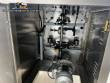 Automatic volumetric dosing packaging machine for powder products.