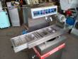 Tempering machine with cover plate coupled to Sidmaq