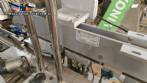 Automatic double-head labeling machine for cylindrical and flat bottles, Tudela, 3,000 labels per hour.