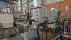 Automatic double-head labeling machine for cylindrical and flat bottles, Tudela, 3,000 labels per hour.