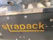 Adhesive tape case sealer with safety enclosure and door sensors Strapack