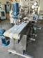 Labeling machine for dropper bottles with double printhead transparent stainless steel label