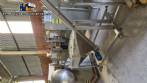 Inclined screw conveyor with stainless steel silo