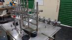 Linear filling machine with 6 pistons filling system