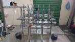 Linear filling machine with 6 pistons filling system
