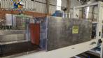 Labeling machine with steam sleeve tunnel and bottle baler