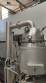 Distiller extractor concentrator with heating jacket and condensation system