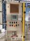 Zegla rotary filling machine with rinser and three-block capping system.
