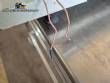 Vibrating trough for multi-head scale