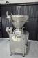 Handtmann vacuum stuffer with twister and tilting elevator, up to 6,000 kg per hour.