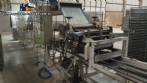 Continuous line laminator, cutter and folder for long dry pasta (tagliatelle).