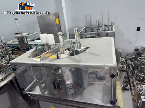 Automatic rotary dosing filling machine with sealer for Delgo cups, 3500 cups per hour. Automatic rotary dosing filling machine with sealer for Delgo cups, 3500 cups per hour.